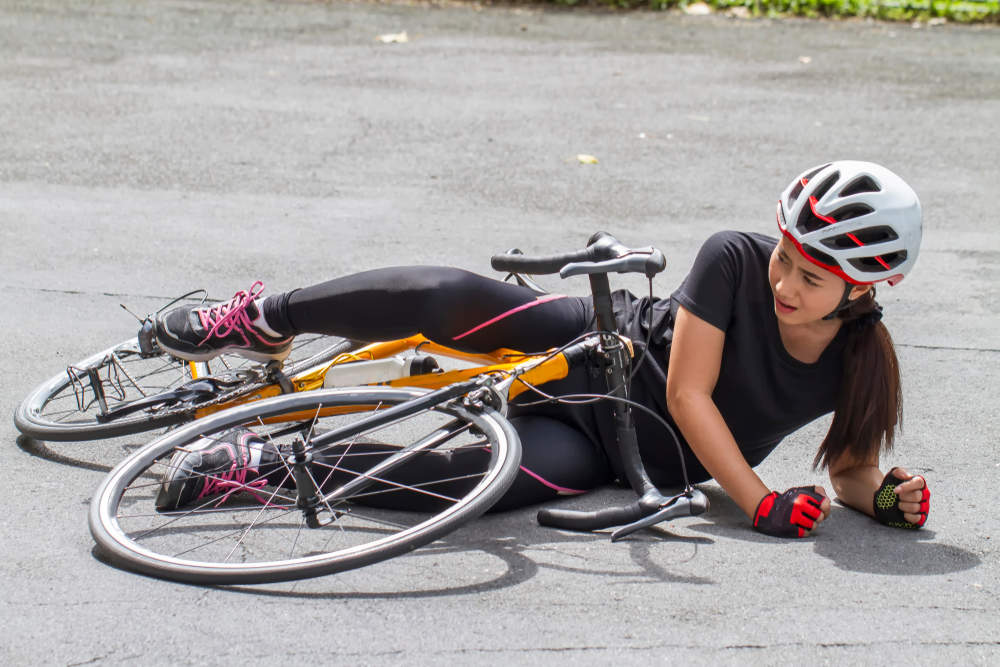 Accident,Woman,On,The,Street,Ground,With,A,Leg,Injury