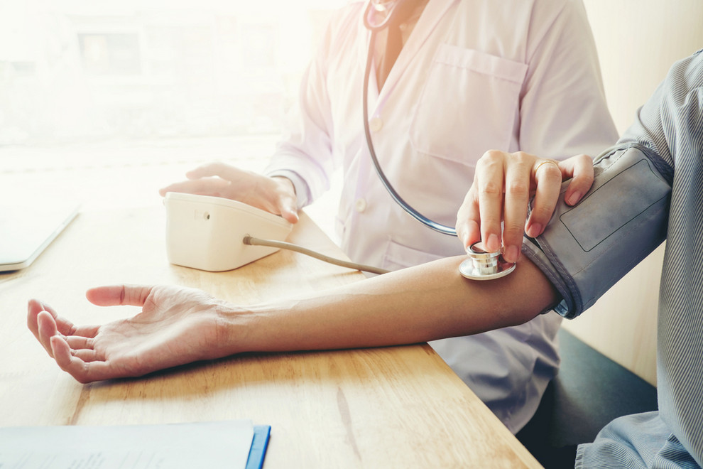 Doctor measuring blood pressure