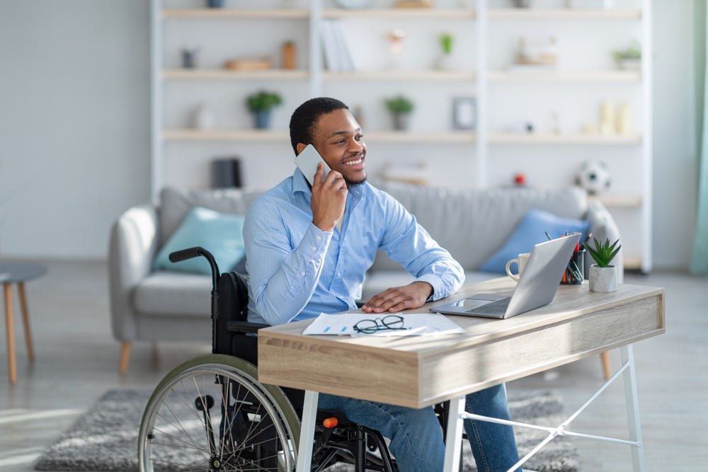 Person in wheelchair calling - What is the Process for Submitting a Long Term Disability Claim