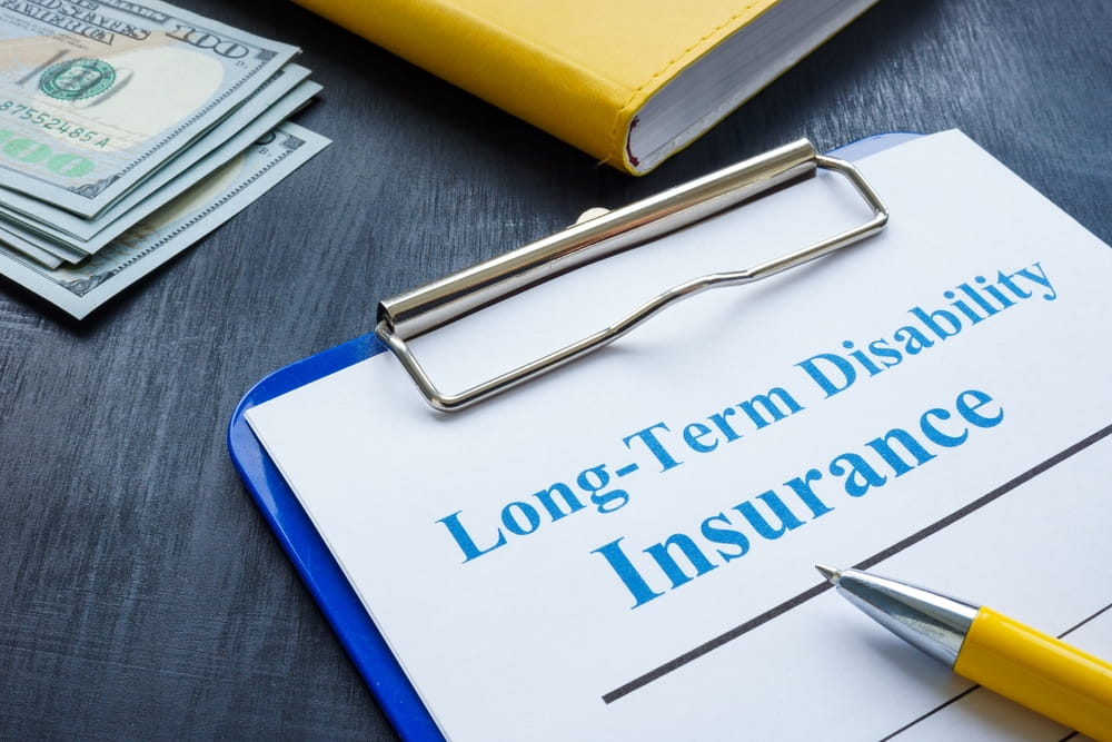 Long term disability insurance documents and financial records